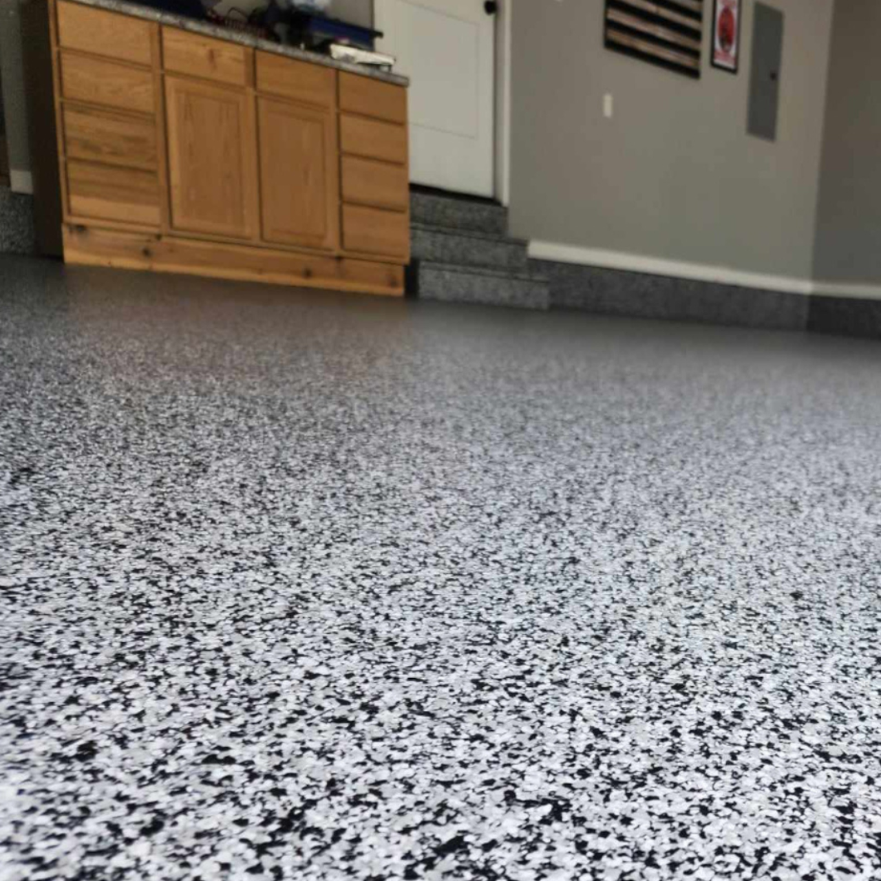 Epoxy garage floor coating Russellville Missouri workshop gray flake