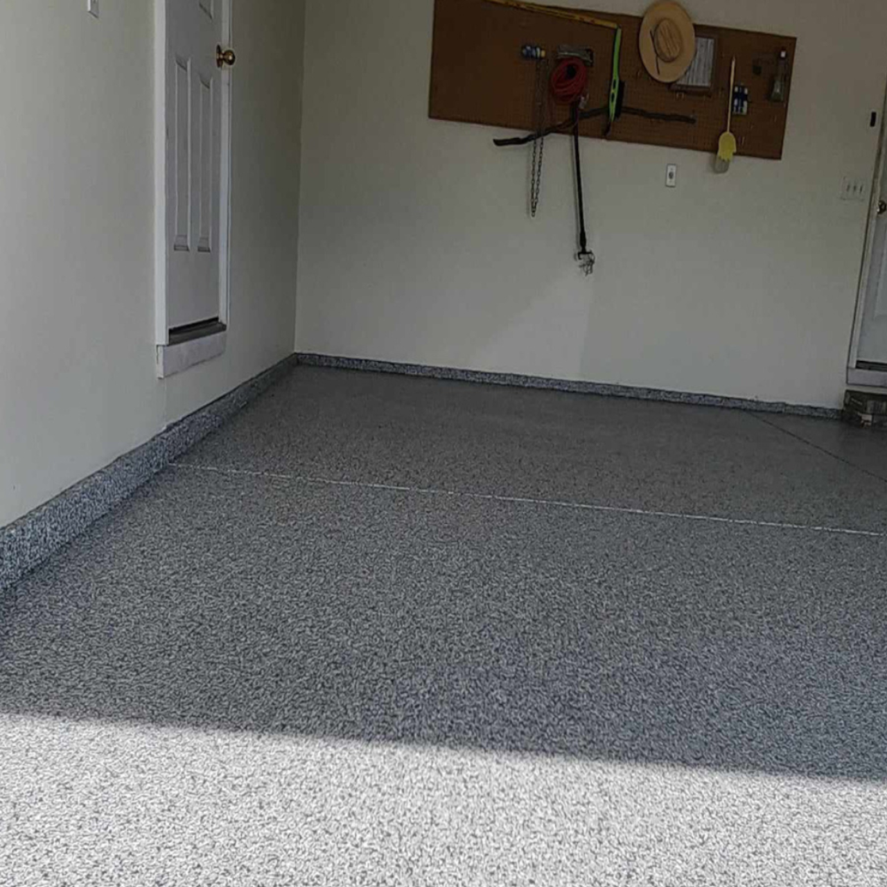 Epoxy garage floor coating Eldon Missouri gray flake finished
