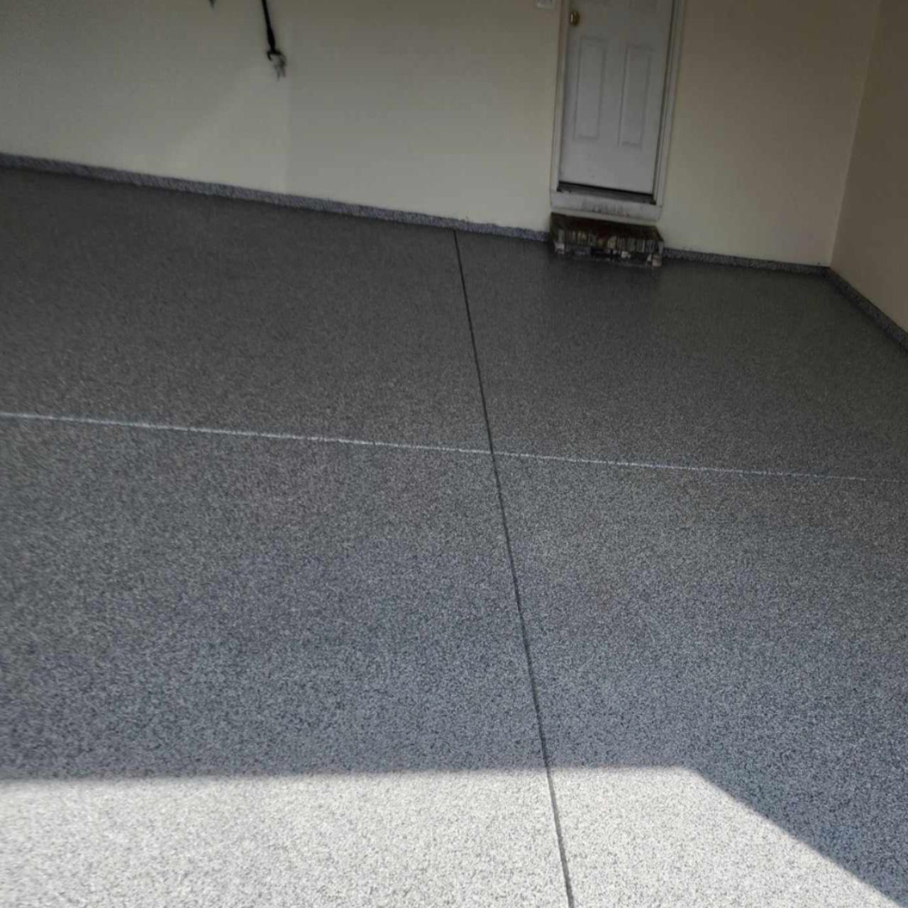Solid color epoxy garage floor gray finished Jefferson City Missouri