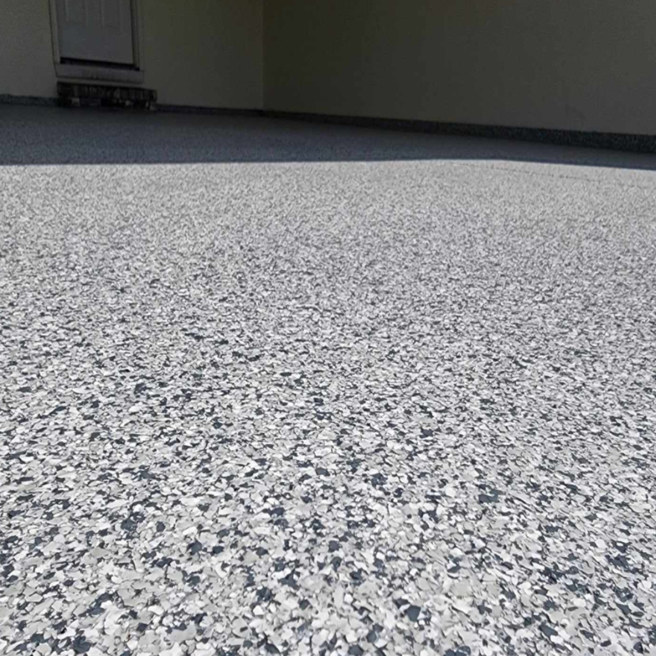 Epoxy garage floor coating California Missouri large gray flake