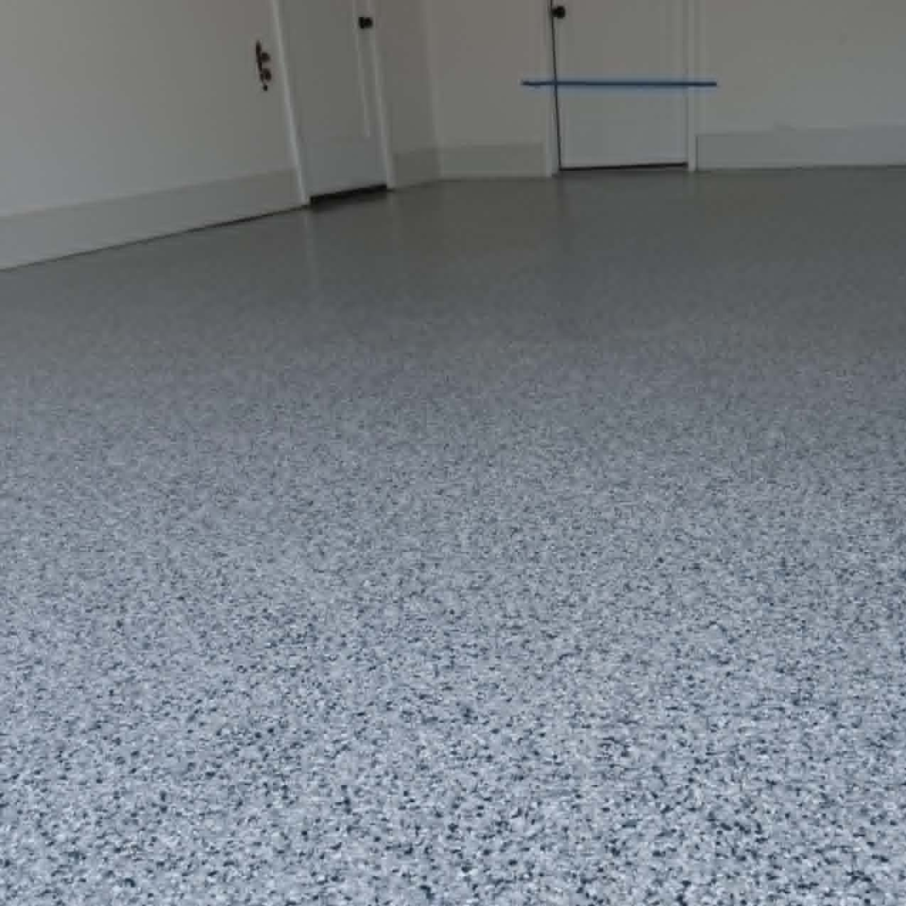 Epoxy garage floor coating Sedalia Missouri light blue flake