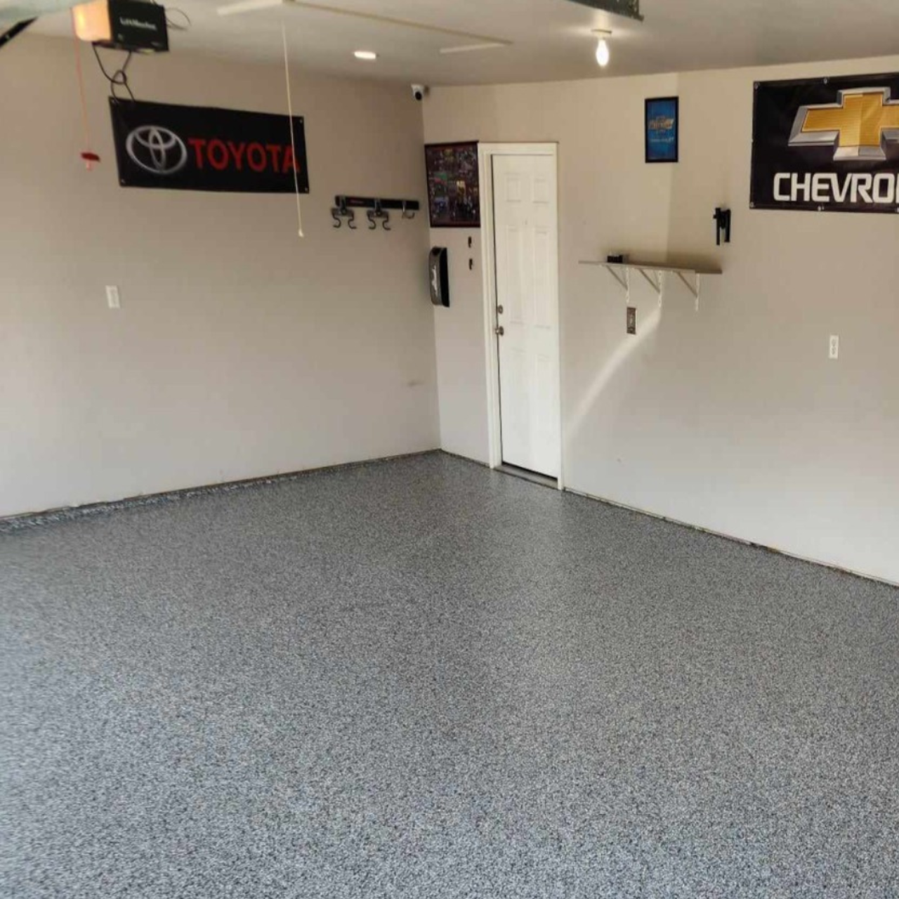 Epoxy garage floor coating Jefferson City Missouri - two car garage flake system