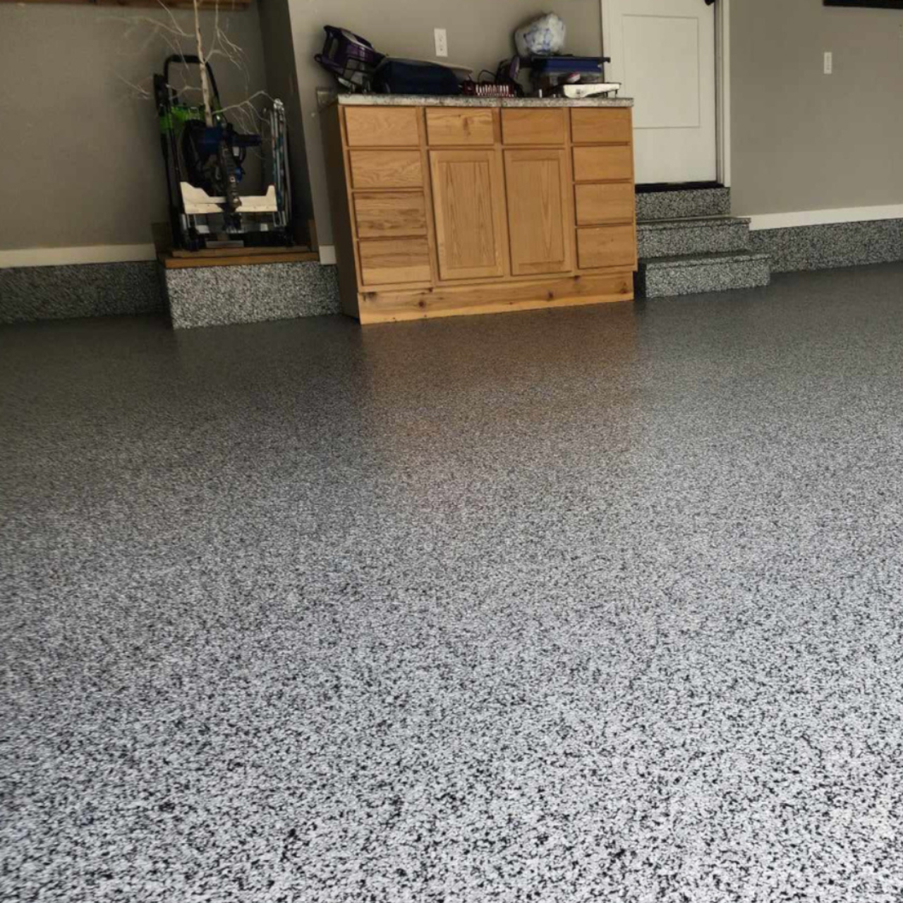 Wide view of a finished gray flake epoxy garage floor near Ashland Missouri