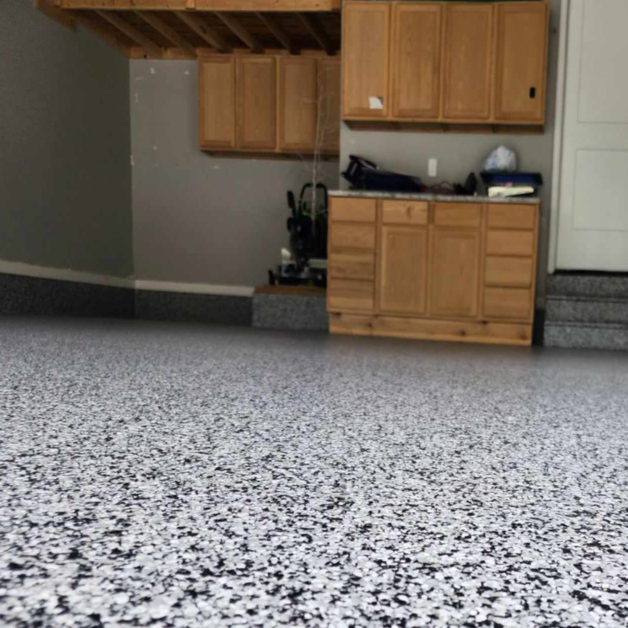 Epoxy garage floor coating Linn Missouri workshop gray flake