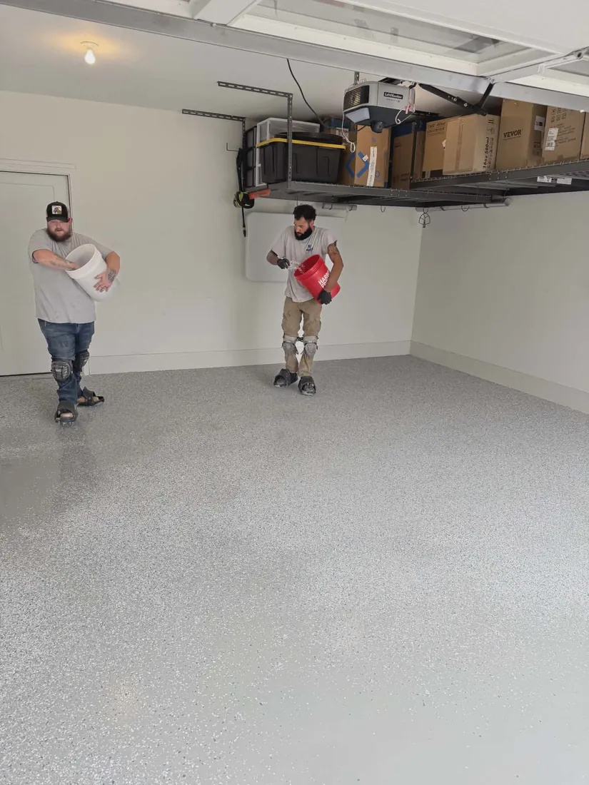 Show Me Epoxy crew finishing garage floor install Jefferson City Missouri