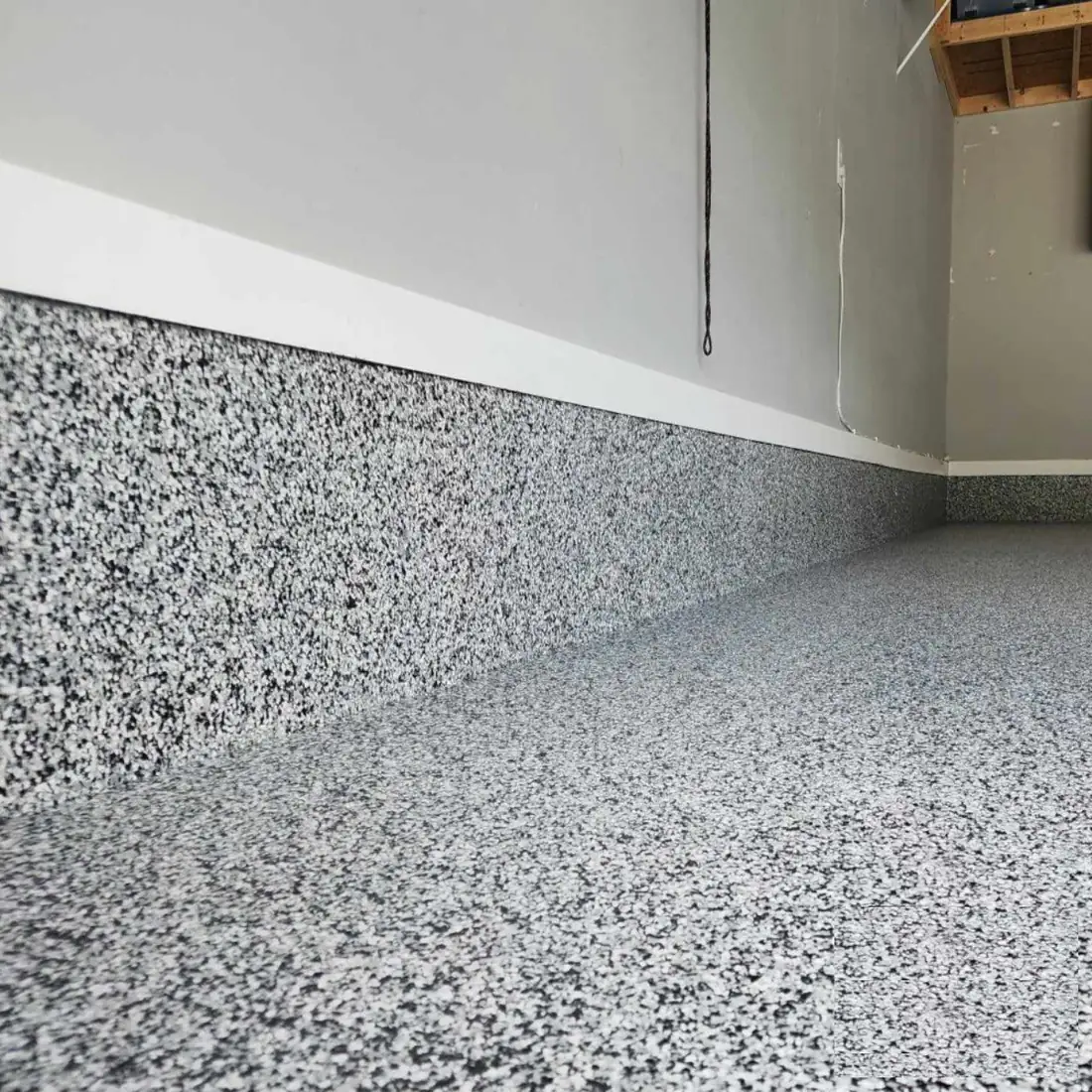 Epoxy garage floor gray flake low angle view Jefferson City Missouri