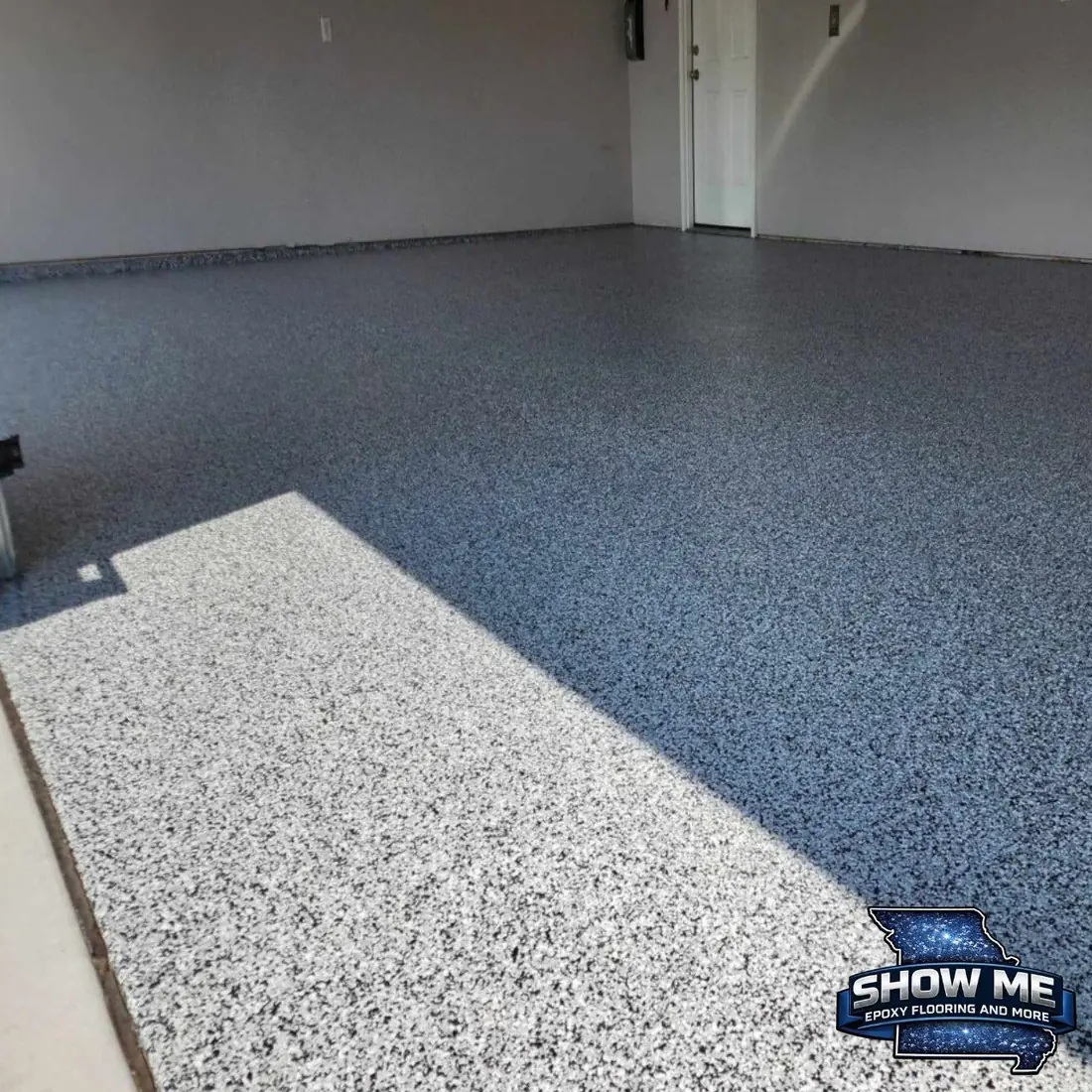 Epoxy garage floor gray flake single car garage Jefferson City Missouri