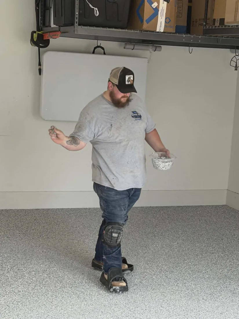 Show Me Epoxy installer prepping hardware before grinding a garage floor